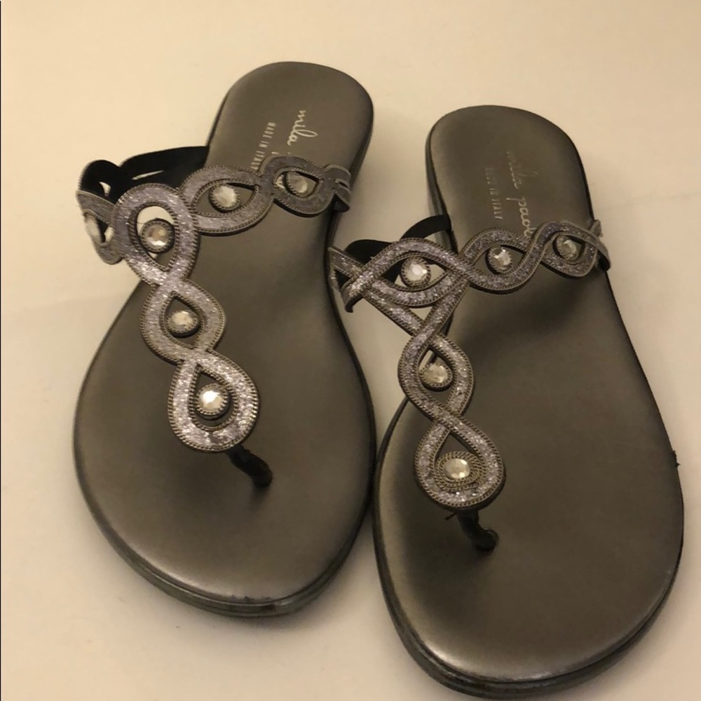 Silver gray flip flops with rhinestones.